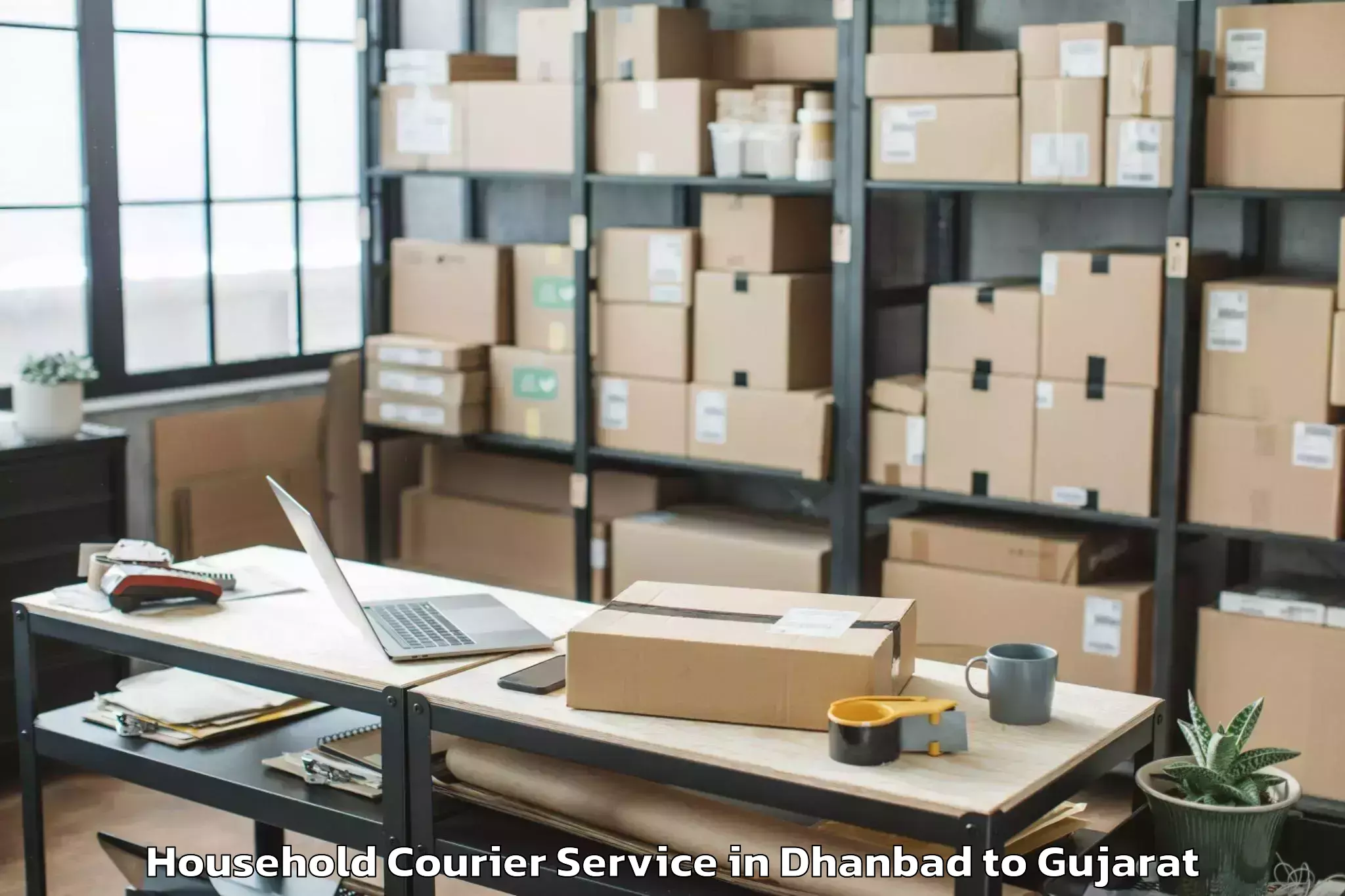 Hassle-Free Dhanbad to Madhav Kampo Household Courier